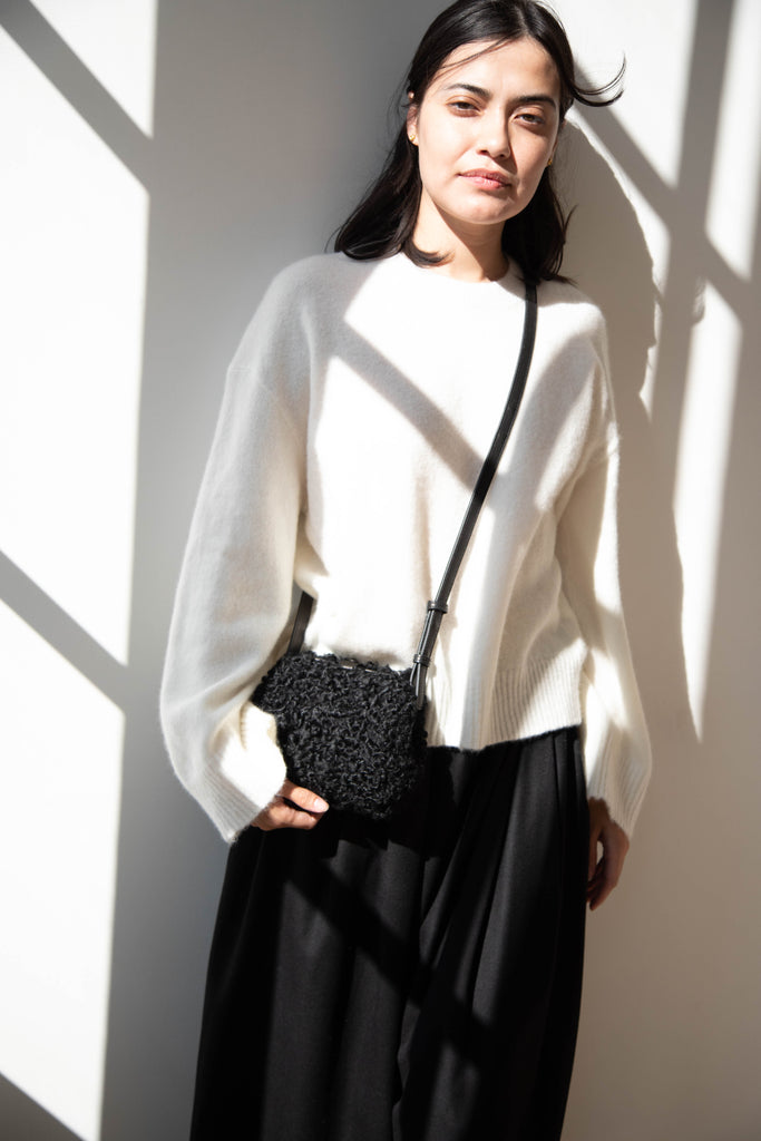 The Backward Vendor | Mini Medicine Cross Body Bag in Black Shearling