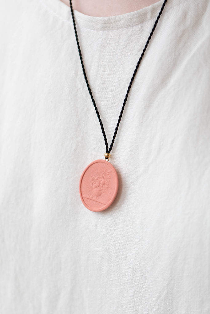 Marcie McGoldrick | Porcelain Cameo Pendant- Vase with Flowers in Coral