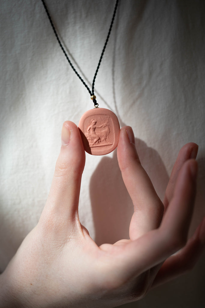 Marcie McGoldrick | Porcelain Cameo Pendant- Diana with Stag in Coral