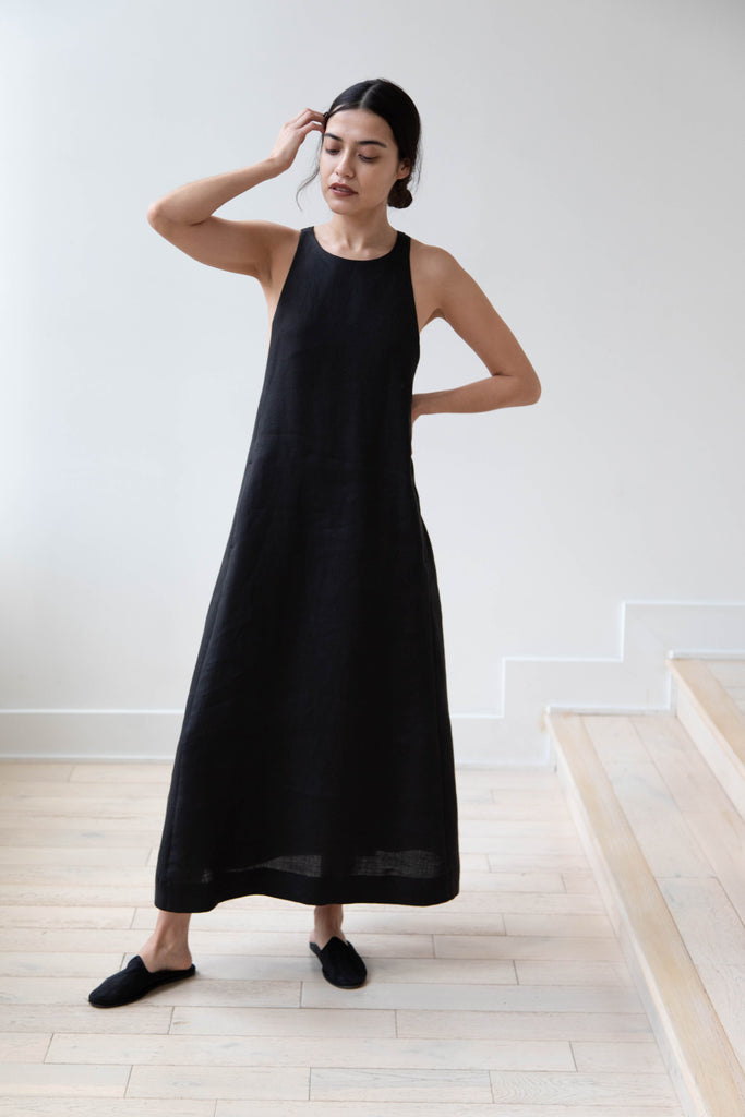 The Loom Linen Cross Back Apron Dress in Black