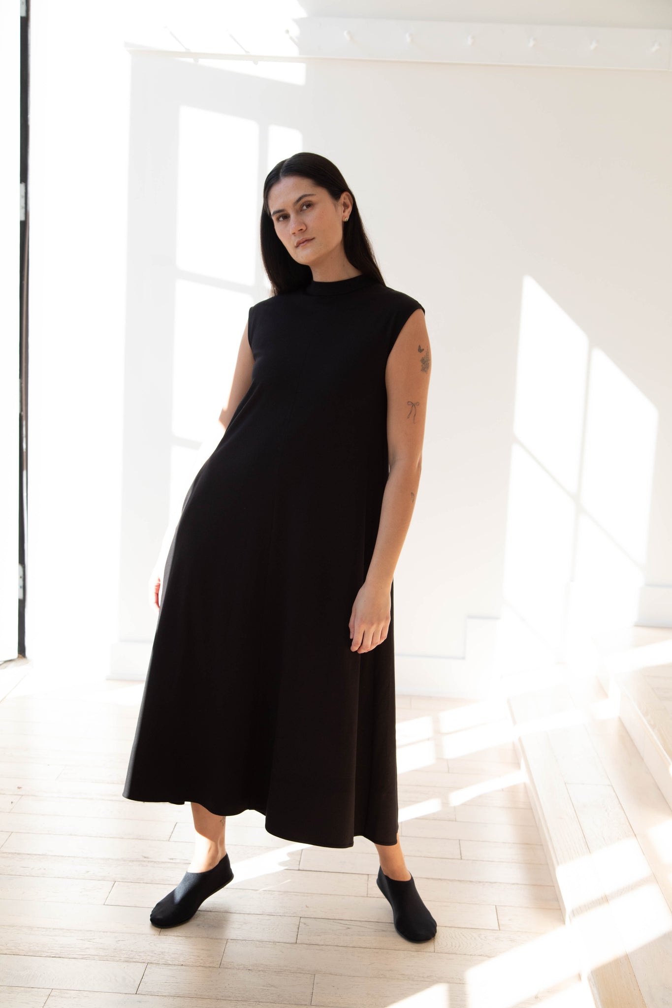 black sleeveless dress flare mini Black / Small Relaxed fit with no stretch Aton | Sleeveless Dress in